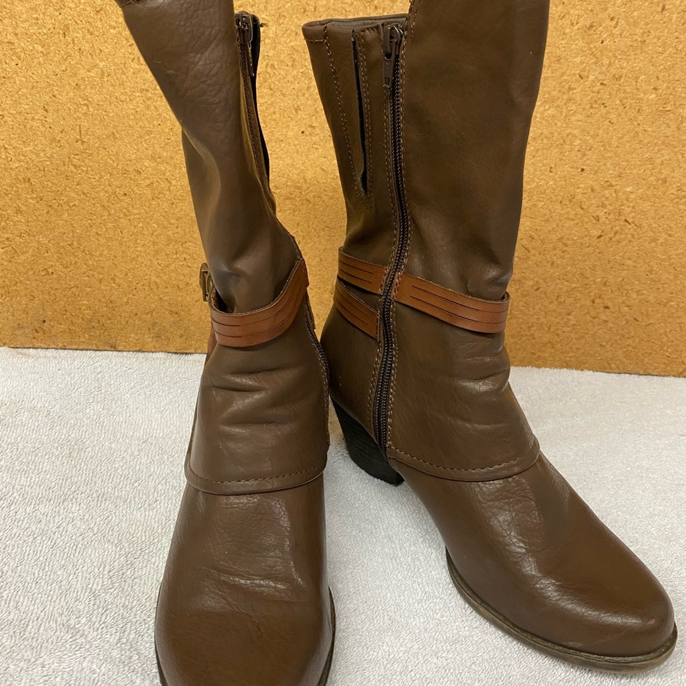 Dark Brown calf length boots. Small heel. Like new .